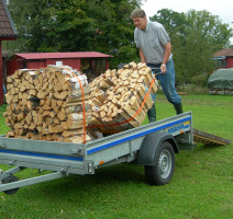 Loading firewood on trailer 4